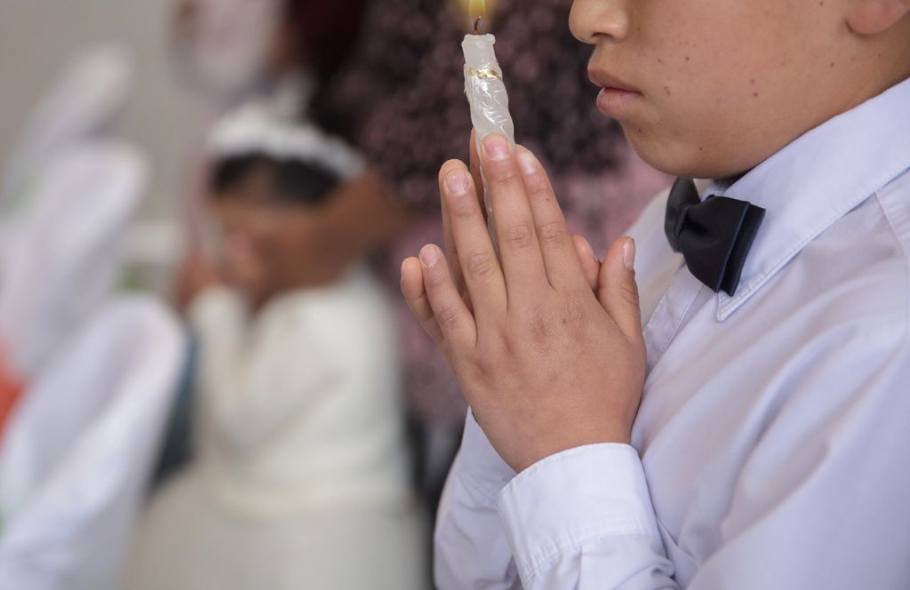 Cumplieron el sacramento junto a los padrinos.