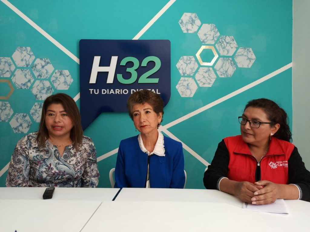 Marcia Tabango, presidenta de la Acovol; Ruth Nohemí Cuestas, Voluntaria del Año, y Nuvia Matailo Aguilar, de Cáritas de la Pastoral Social, en su visita al diario digital HORA32.
